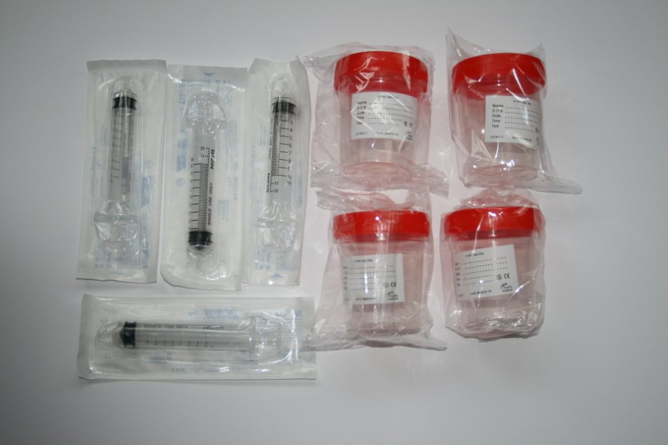 Quadruple home insemination kit featuring 4 specimen cups and 4 syringes